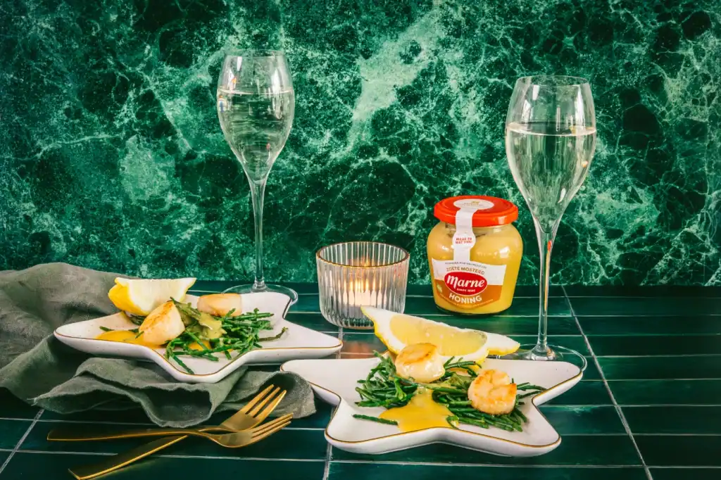 Coquilles met mosterd beurre blanc en gezouten citroen